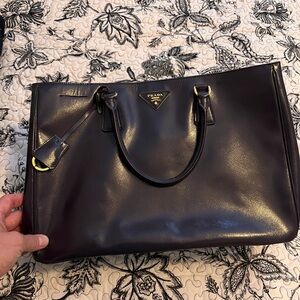 Prada Dark purple Leather Handbag with Gold Accents